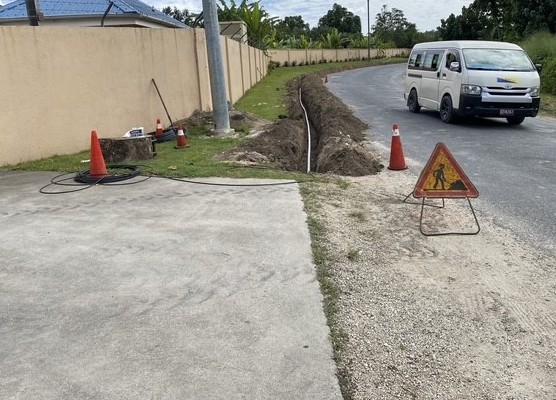 Traffic control and roadside works during Vanuatu fibre installation